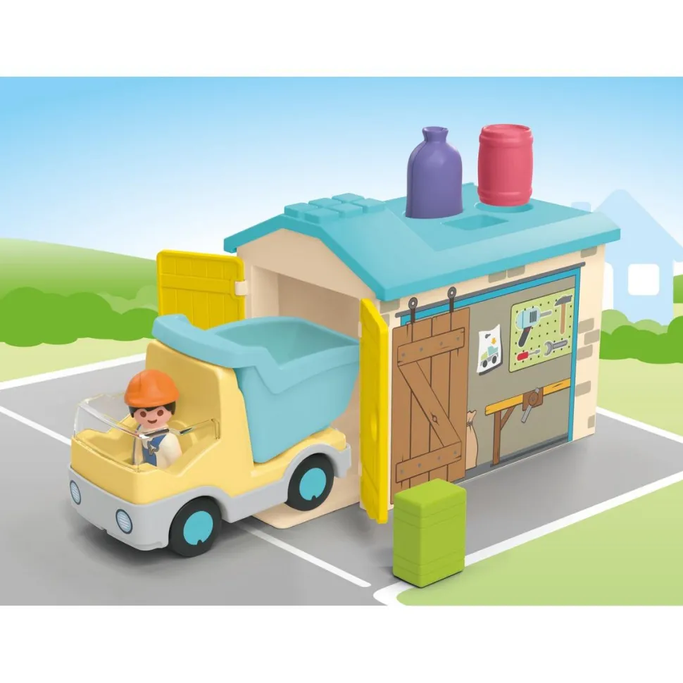 Ouvrier avec camion et garage Playmobil Junior 71686